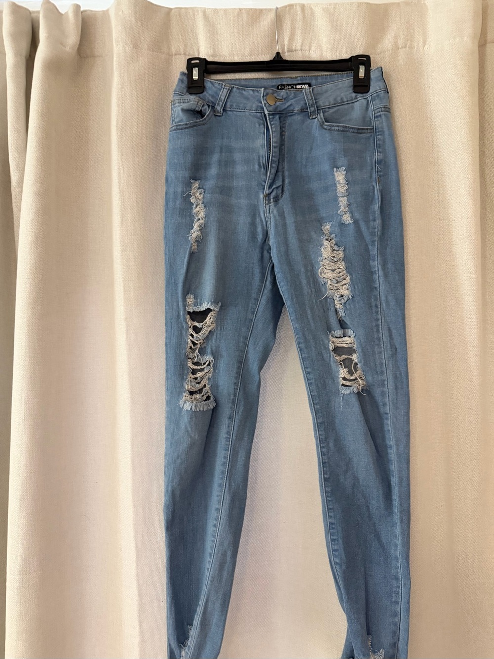 Fashion Nova Light Blue Distressed Skinny Jeans